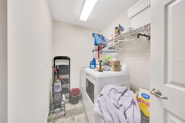 3418 SW 155th Pl, Ocala, FL 34473 - washroom with washer and clothes dryer and tile patterned floors