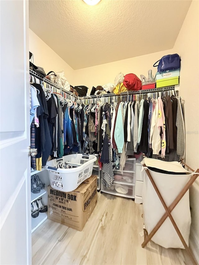 186 NW 44th St, Ocala, FL 34475 - walk in closet featuring wood finished floors