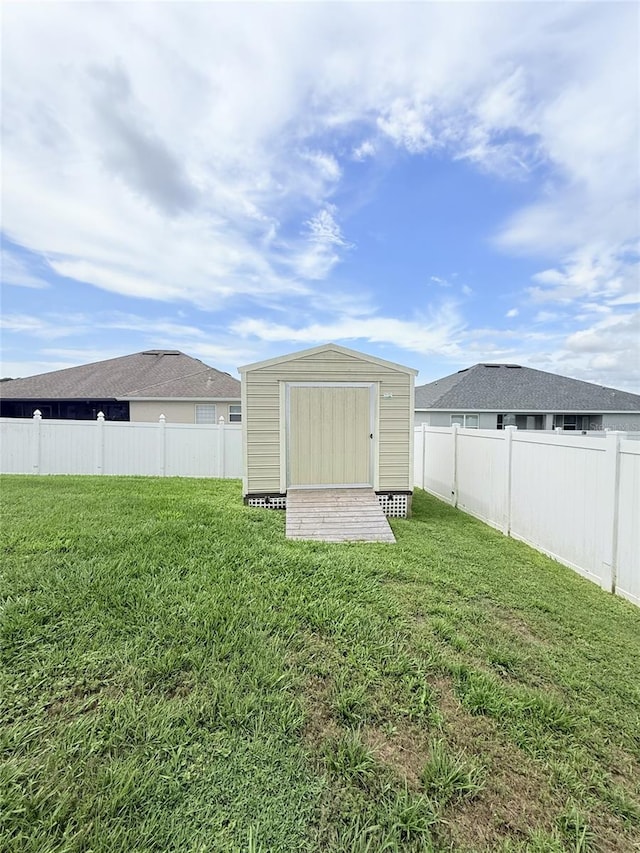 186 NW 44th St, Ocala, FL 34475 - fenced backyard with a storage unit