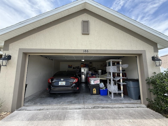 186 NW 44th St, Ocala, FL 34475 - garage featuring driveway