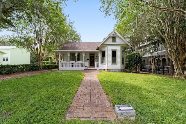 828 SE 3rd St, Ocala, FL 34471 - victorian house featuring covered porch