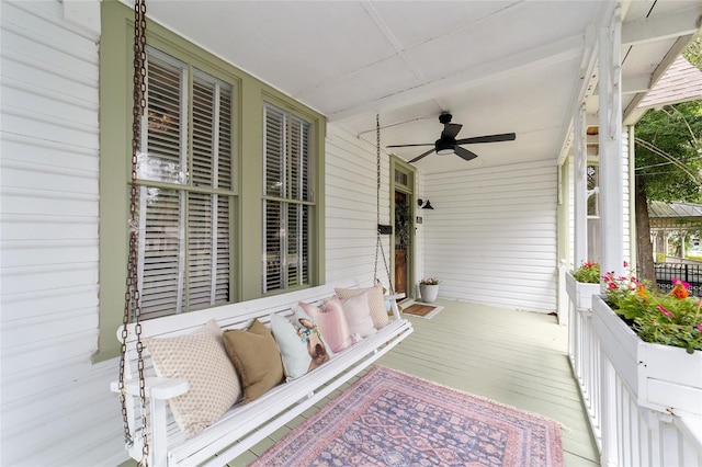 828 SE 3rd St, Ocala, FL 34471 - wooden porch with ceiling fan
