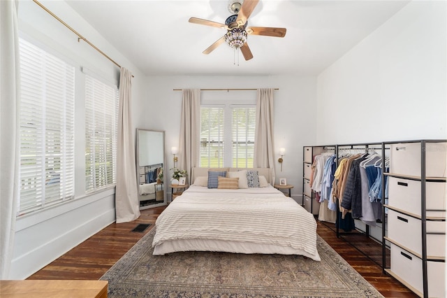 828 SE 3rd St, Ocala, FL 34471 - bedroom featuring dark wood finished floors and a ceiling fan