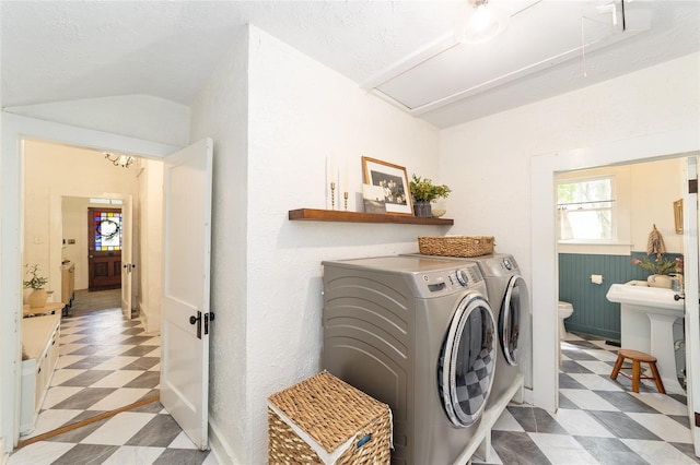 828 SE 3rd St, Ocala, FL 34471 - laundry room featuring attic access, tile patterned floors, and independent washer and dryer