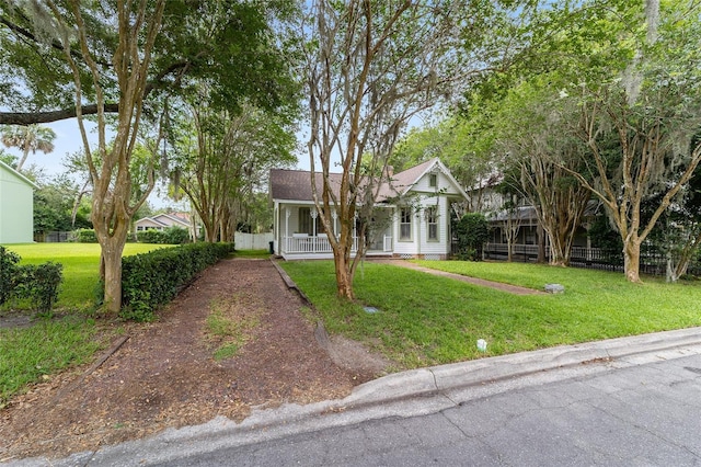828 SE 3rd St, Ocala, FL 34471 - view of front of home with covered porch and driveway
