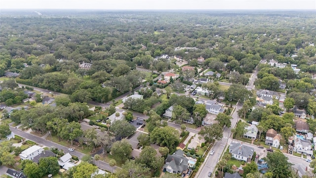 828 SE 3rd St, Ocala, FL 34471 - aerial view of property and surrounding area featuring nearby suburban area and a heavily wooded area
