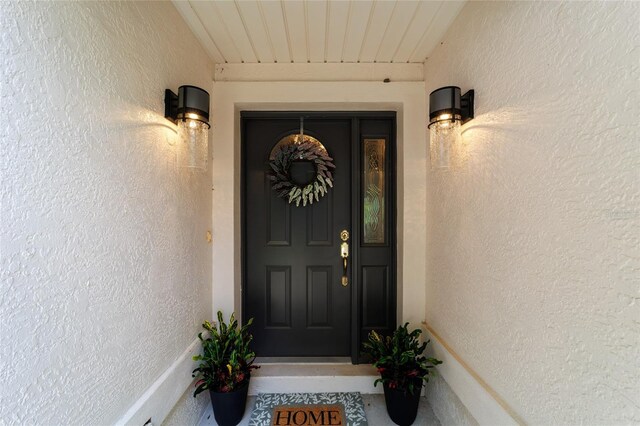 2644 SW 20th Cir, Ocala, FL 34471 - view of exterior entry featuring stucco siding