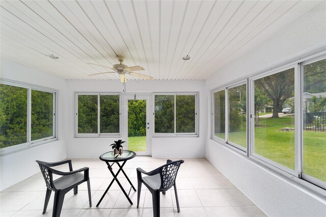 2644 SW 20th Cir, Ocala, FL 34471 - sunroom featuring ceiling fan, tile patterned floors, and wooden ceiling