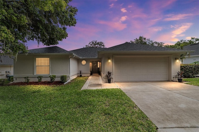 2644 SW 20th Cir, Ocala, FL 34471 - ranch-style house featuring stucco siding, concrete driveway, a garage, a front lawn, and a shingled roof