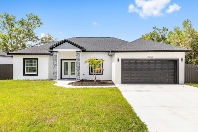 8456 SE 164th Pl, Summerfield, FL 34491 - view of front of house with french doors, a garage, stucco siding, concrete driveway, and stone siding