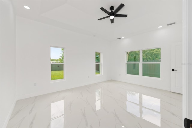 8456 SE 164th Pl, Summerfield, FL 34491 - unfurnished room with healthy amount of natural light, marble tiled flooring, baseboards, recessed lighting, and a ceiling fan