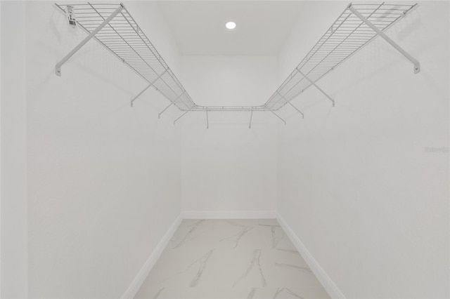 8456 SE 164th Pl, Summerfield, FL 34491 - walk in closet with light marble finish floors