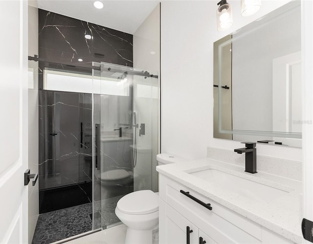 8456 SE 164th Pl, Summerfield, FL 34491 - full bath featuring toilet, vanity, and a marble finish shower