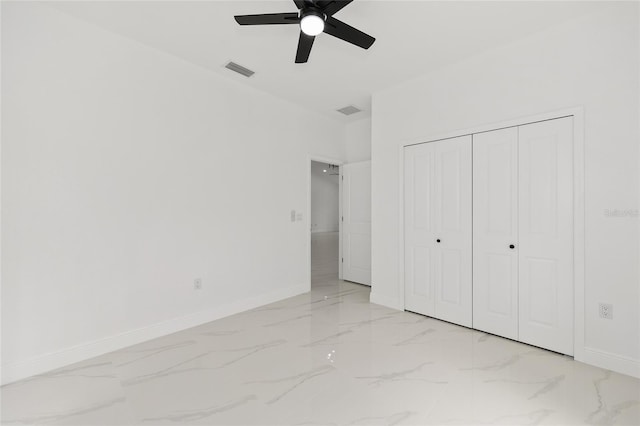 8456 SE 164th Pl, Summerfield, FL 34491 - unfurnished bedroom featuring baseboards and light marble finish floors