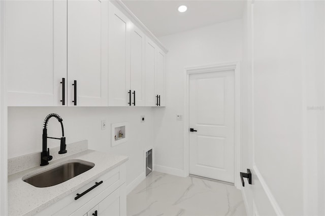 8456 SE 164th Pl, Summerfield, FL 34491 - washroom with cabinet space, electric dryer hookup, light marble finish floors, baseboards, and recessed lighting
