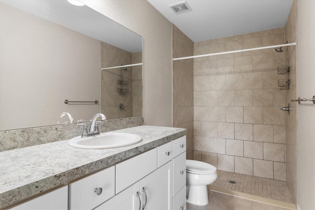 17277 SW 44th Cir, Ocala, FL 34473 - full bathroom with vanity, toilet, tile patterned floors, and tiled shower