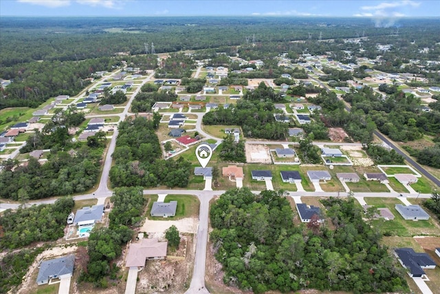 17277 SW 44th Cir, Ocala, FL 34473 - aerial overview of property's location with a heavily wooded area and nearby suburban area