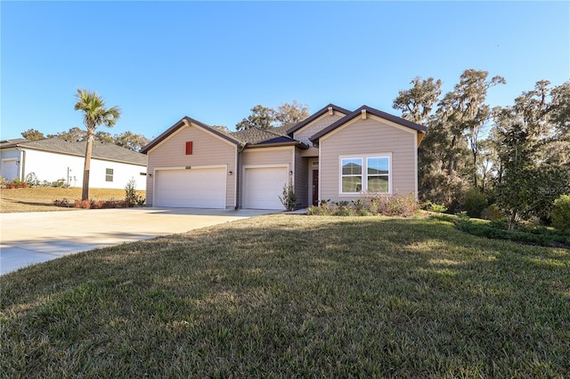 19551 SW 77th Loop, Dunnellon, FL 34432 - single story home with driveway, an attached garage, and a front yard