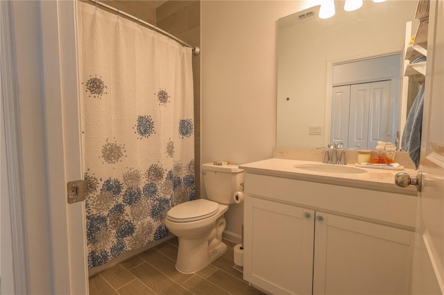 19551 SW 77th Loop, Dunnellon, FL 34432 - full bathroom with toilet, vanity, and curtained shower