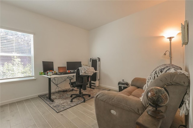 19551 SW 77th Loop, Dunnellon, FL 34432 - office area featuring baseboards and wood finished floors