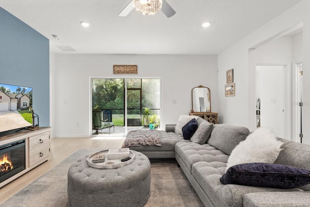 19551 SW 77th Loop, Dunnellon, FL 34432 - living room with ceiling fan, wood finished floors, and recessed lighting