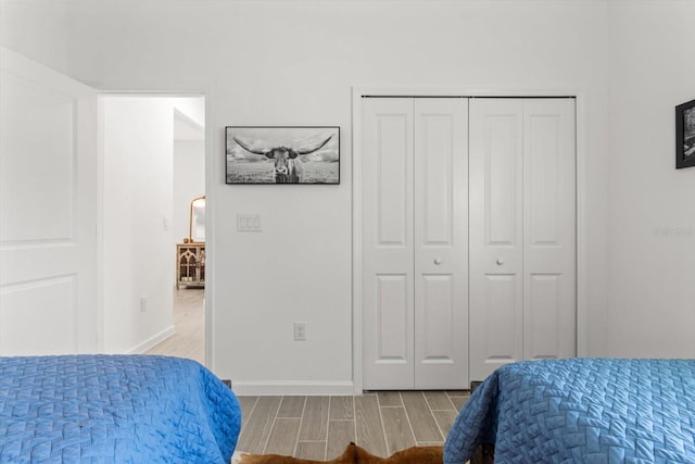 19551 SW 77th Loop, Dunnellon, FL 34432 - bedroom with wood finish floors and a closet