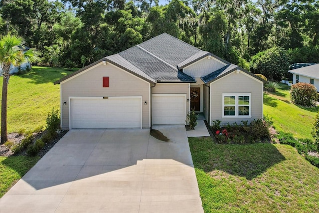 19551 SW 77th Loop, Dunnellon, FL 34432 - single story home with an attached garage, concrete driveway, a front lawn, and view of scattered trees