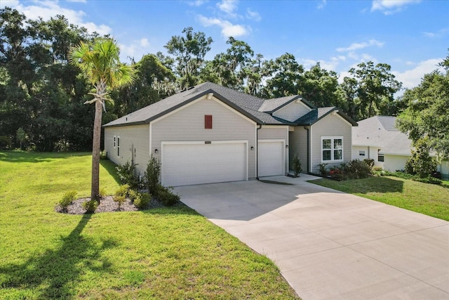 19551 SW 77th Loop, Dunnellon, FL 34432 - single story home with a garage, a front yard, and driveway