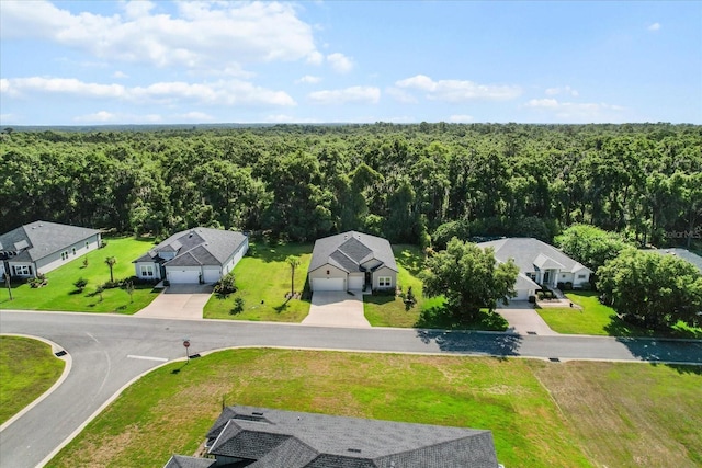 19551 SW 77th Loop, Dunnellon, FL 34432 - aerial perspective of suburban area featuring a forest