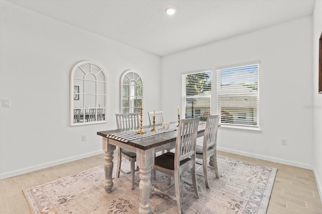 19551 SW 77th Loop, Dunnellon, FL 34432 - dining room featuring light wood-style floors and recessed lighting