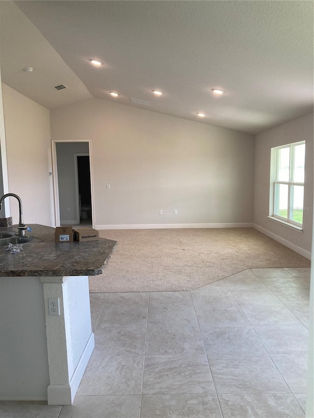 2 Pine Course Trl, Ocala, FL 34472 - unfurnished room with light carpet, baseboards, lofted ceiling, a sink, and recessed lighting