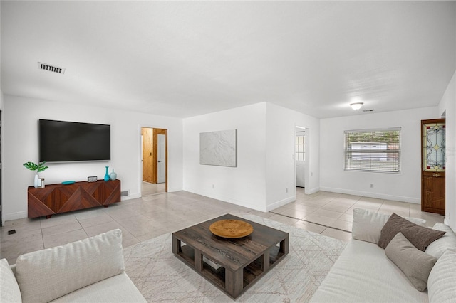 3331 SE 4th St, Ocala, FL 34471 - living area featuring light tile patterned floors and baseboards