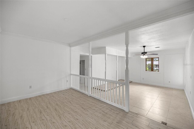 3331 SE 4th St, Ocala, FL 34471 - empty room featuring crown molding, ceiling fan, baseboards, and light wood-style flooring