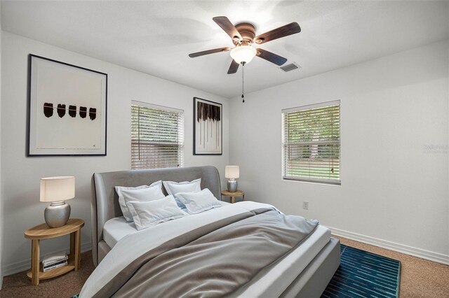3331 SE 4th St, Ocala, FL 34471 - carpeted bedroom featuring baseboards and a ceiling fan
