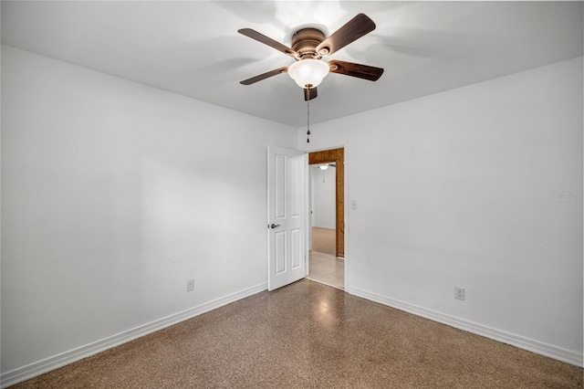 3331 SE 4th St, Ocala, FL 34471 - empty room with baseboards, ceiling fan, and speckled floor