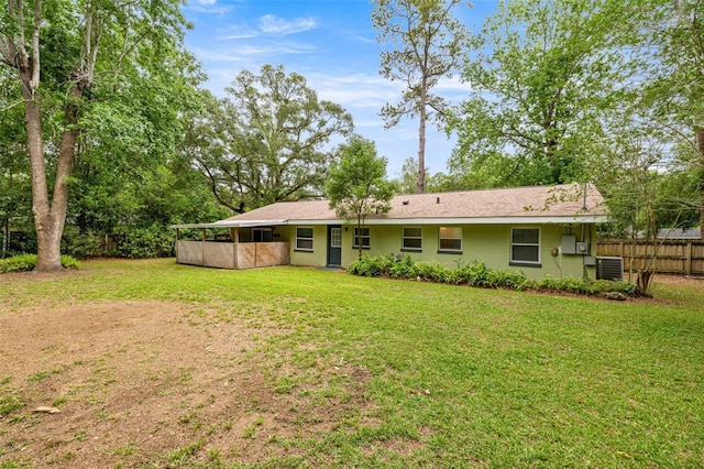 3331 SE 4th St, Ocala, FL 34471 - rear view of property featuring concrete block siding and central AC unit