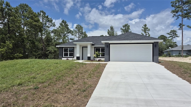 717 Marion Oaks Mnr, Ocala, FL 34473 - view of front of house with concrete driveway, a garage, stucco siding, and a front lawn
