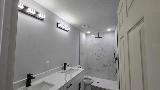 717 Marion Oaks Mnr, Ocala, FL 34473 - full bathroom featuring a marble finish shower, a textured ceiling, and double vanity