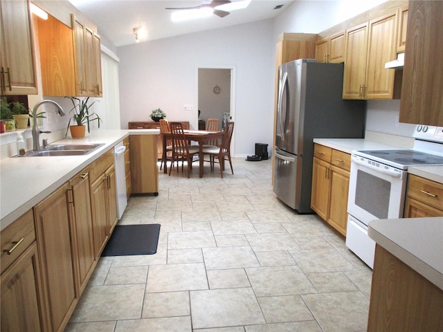 14192 SW 112th Cir, Dunnellon, FL 34432 - kitchen with white appliances, a sink, vaulted ceiling, ceiling fan, and light countertops