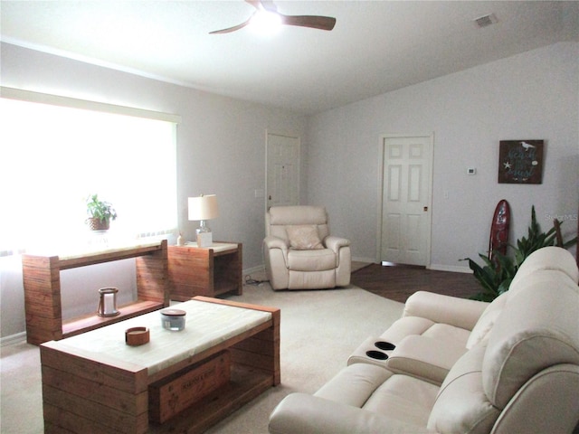 14192 SW 112th Cir, Dunnellon, FL 34432 - carpeted living area featuring a ceiling fan, baseboards, and vaulted ceiling