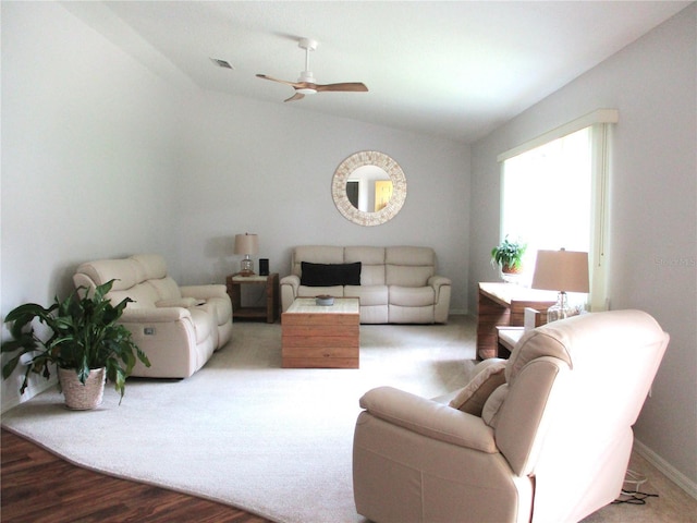14192 SW 112th Cir, Dunnellon, FL 34432 - living room with ceiling fan, vaulted ceiling, baseboards, and wood finished floors