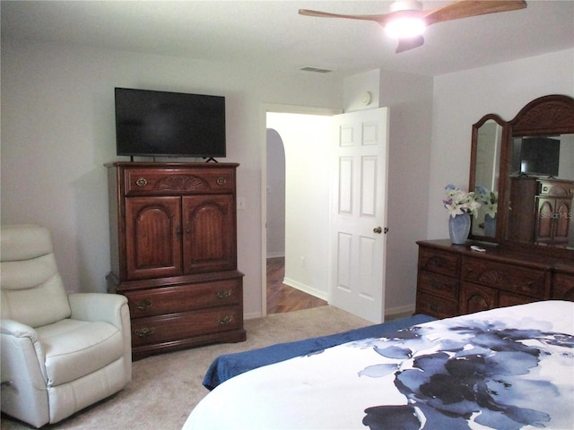 14192 SW 112th Cir, Dunnellon, FL 34432 - bedroom featuring light carpet and a ceiling fan