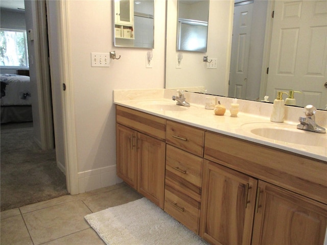 14192 SW 112th Cir, Dunnellon, FL 34432 - ensuite bathroom with double vanity and tile patterned floors
