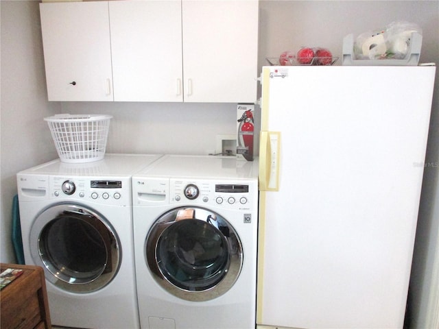 14192 SW 112th Cir, Dunnellon, FL 34432 - laundry room featuring independent washer and dryer and cabinet space
