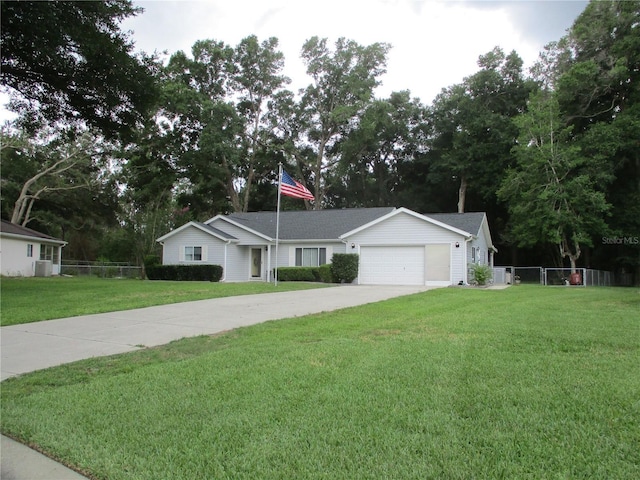 14192 SW 112th Cir, Dunnellon, FL 34432 - single story home featuring driveway, a garage, and central AC