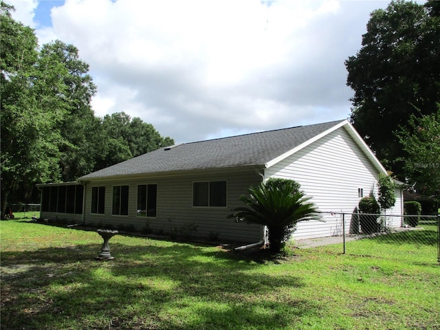 14192 SW 112th Cir, Dunnellon, FL 34432 - view of home's exterior featuring a sunroom