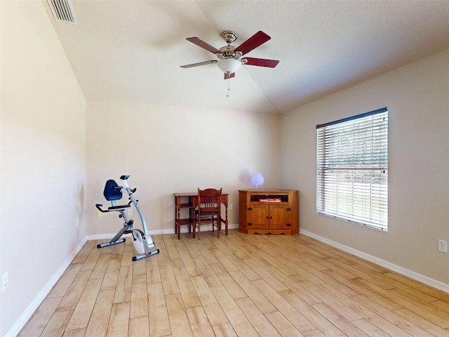 8080 N Susan Ave, Dunnellon, FL 34433 - exercise area featuring lofted ceiling, a ceiling fan, and light wood finished floors