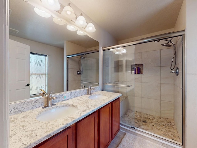 8080 N Susan Ave, Dunnellon, FL 34433 - full bathroom with a shower stall, double vanity, and tile patterned floors