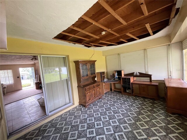 104 S Jeffery St, Beverly Hills, FL 34465 - office area featuring dark colored carpet