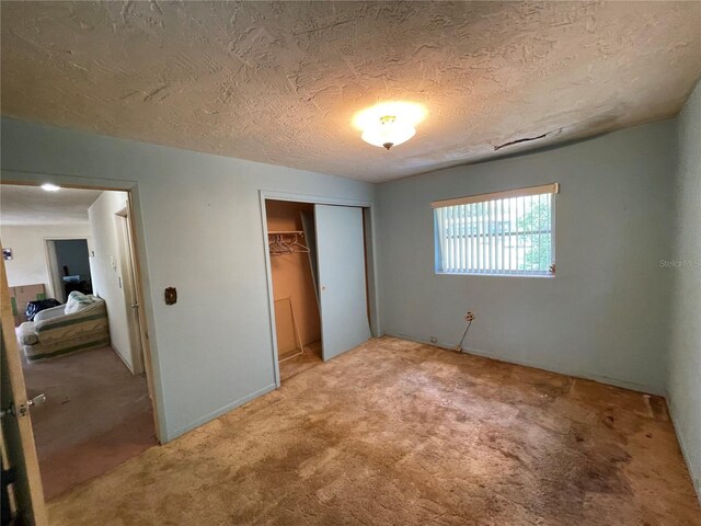 104 S Jeffery St, Beverly Hills, FL 34465 - unfurnished bedroom with carpet, a closet, and a textured ceiling